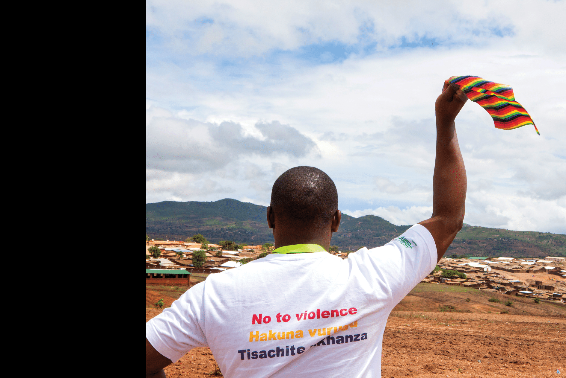 Michael Kaiyatsa, Advocacy Manager at Malawi’s Centre for Human Rights and Rehabilitation (CHRR), Malawi, a RRF recipient, looking over at Dzaleka refugee camp. He's been carrying out research and interventions at the camp to reduce LGBT-related stigma and discrimination and improve security for LGBT aslum seekers and refugees. He accuses the UNHCR in Malawi of being homophobic. See Matofu & Didier's web stories for more info (both aliases).
