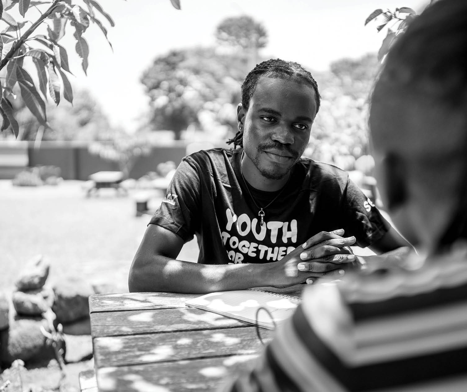 Robert, an Ordaa Advocate, provides advice on HIV and sexual and reproductive health and rights to Divine, a community member, at GALZ’s wellness centre in Harare, Zimbabwe.