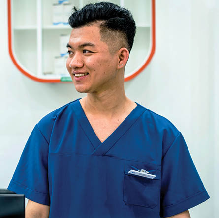 A portrait shows Pham Minh Anh, 26, Lighthouse healthcare provider, in Hanoi, Vietnam on 26th March 2021. Frontline AIDS, in partnership with the Elton John AIDS Foundation (EJAF), has provided emergency COVID-19 grants to community-based organisations such as Lighthouse, a Vietnam-based community organisation that helps individuals most affected by HIV.