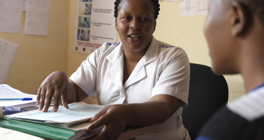A female nurse counseling at a HIV Counseling and Testing clinic
